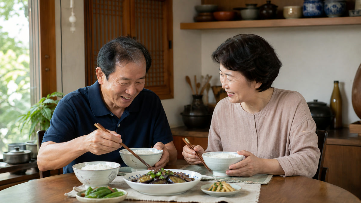 가지볶음의 양파와 마늘 양을 나눠 개인의 복부 불편을 확인하는 식탁